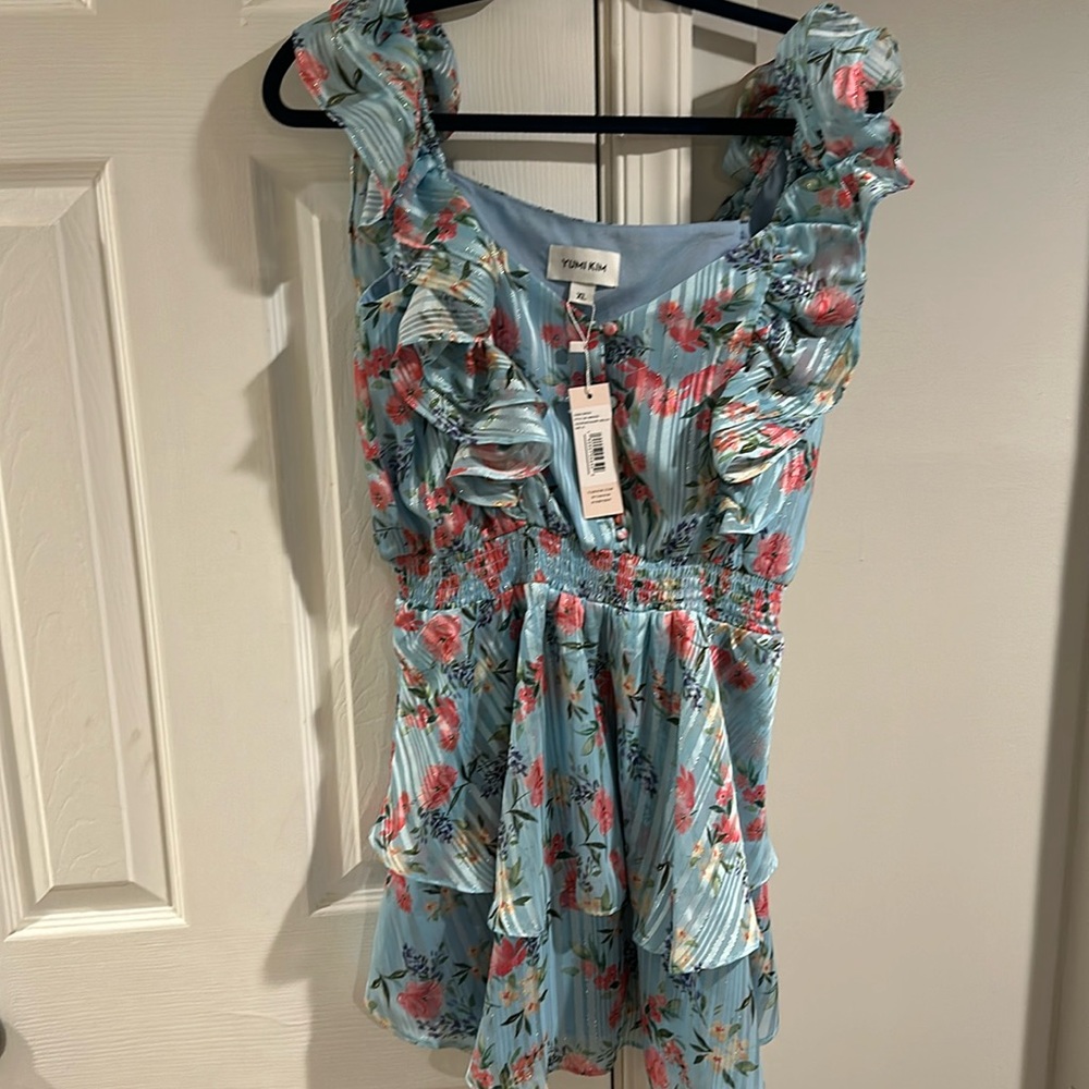 Brand new dress with tags. Super cute especially for Spring